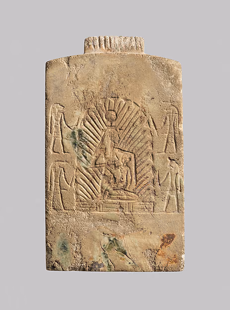 Isis nursing the infant Horus in the marsh, seated under an arched canopy, on a pectoral.
